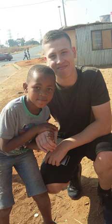 Jordan and a local child